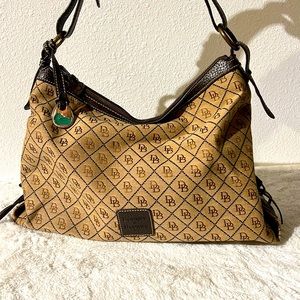 Dooney & Bourke Signature Print Leather Strap Over The Shoulder Satchel Handbag.